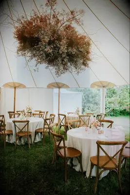 Dried floral chandelier at boho wedding