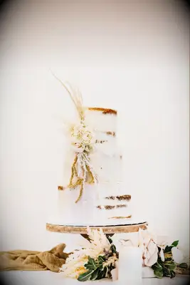 Semi-naked cake at boho wedding