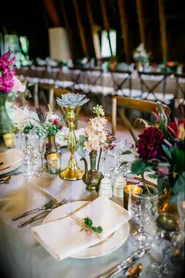 Gold antique vases at boho wedding