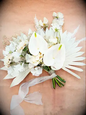 All white wedding bouquet at a boho wedding