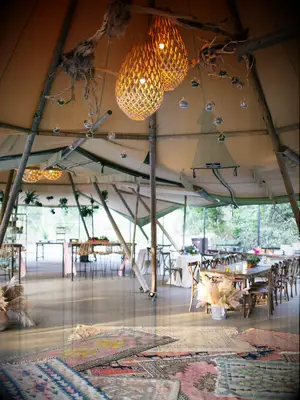 Macrame light fixtures at bohemian wedding