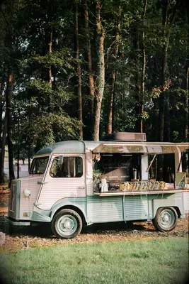 Flower crown vintage bus at boho wedding