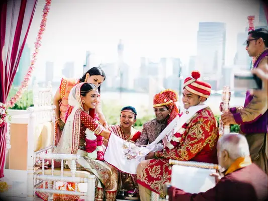 Bride and groom during Hindu Hasta Milap unity ceremony