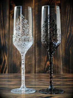 painted wedding champagne glasses with black and white swirl design