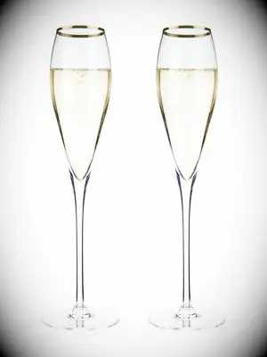 Gold-rimmed wedding champagne flutes