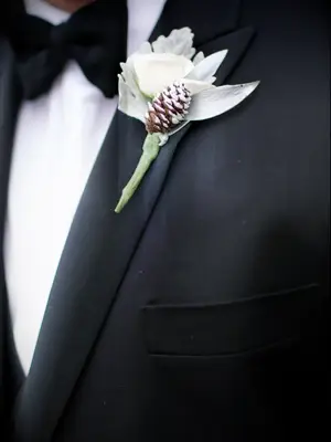 winter wedding ideas pinecone boutonniere
