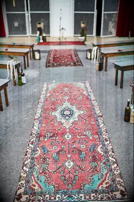 antique red kilim rug as boho wedding ceremony aisle runner 