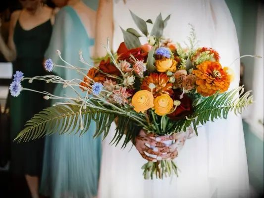 An autumnal bouquet with cornflower blooms
