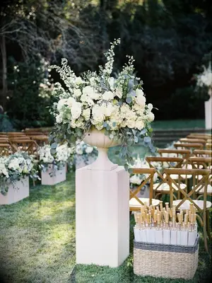 Ceremony aisle marker flower arrangement with stock, eucalyptus and rose