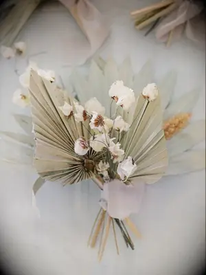 Boutonniere with dried palm leaf