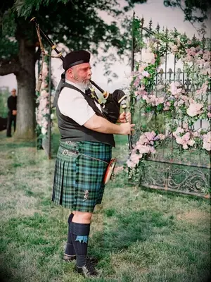 Celtic bagpiper at wedding