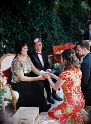 Couple serving tea during Chinese tea ceremony