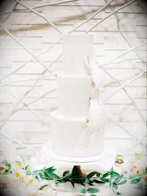 modern wedding cake with torn paper decoration