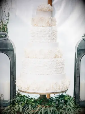 white ruffled wedding cake