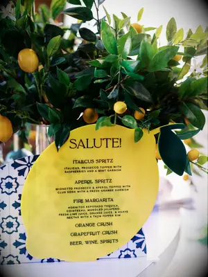 An Amalfi lemon-themed Italian cocktail sign.