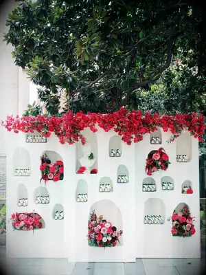 A stunning white and red floral arrangement.