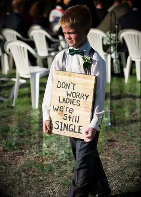 Funny ring bearer wedding sign