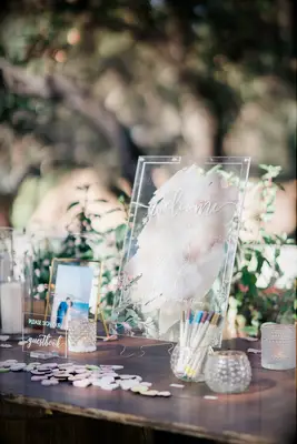 Acrylic frame filled with wood heart tokens