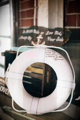 alternative wedding guest book idea vintage life preserver