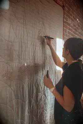 Guest writing on quilt guest book