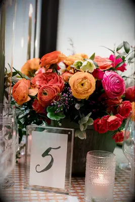Bright Spring Centerpiece with Ranunculus and Roses