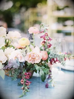 Spring flower arrangement with ranunculus and foxglove