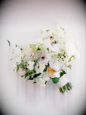 purple-and-white bouquet of butterfly ranunculus