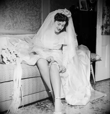 Old image of a woman wearing a garter