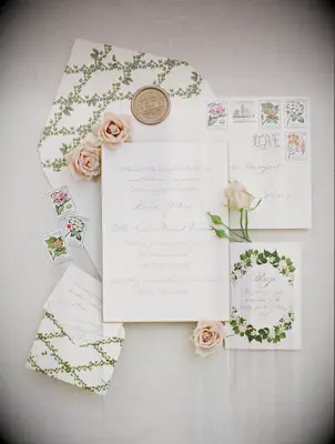 elegant spring wedding invitation with lattice envelope liner, vintage floral motifs, calligraphy and gold wax seal stamp