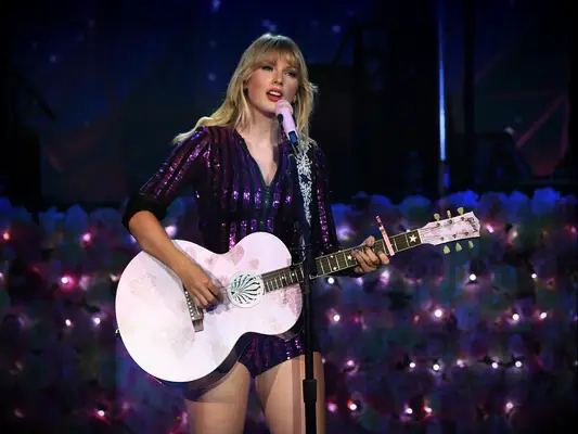 Taylor Swift performing songs from Lover