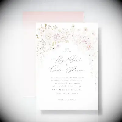 Pink and gold foil floral wedding invitation with formal date and time wording