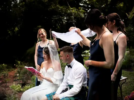 Bride reading reading Persian wedding ceremony