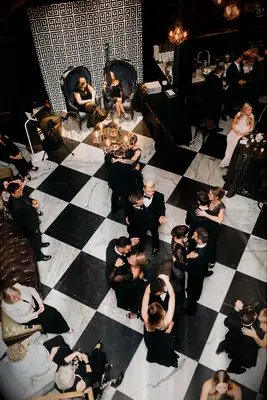 Black and white checkered dance floor for Great Gatsby themed wedding