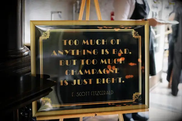Black and gold Great Gatsby quote wedding sign