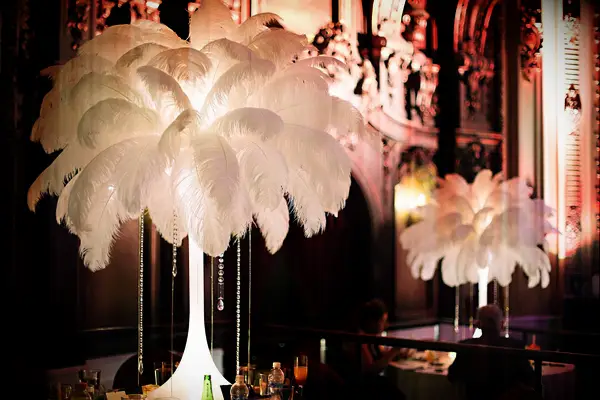Feather and crystal centerpieces for Great Gatsby themed wedding
