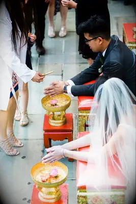 Couple during Thai water blessing ceremony