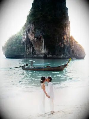 Couple kissing on the beach in Thailand