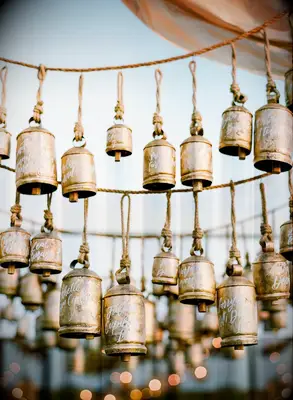 Vintage bells calligraphed to be used as escort cards