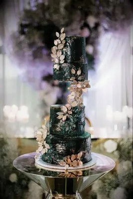 Green and Gold Wedding Cake with trailing leaves