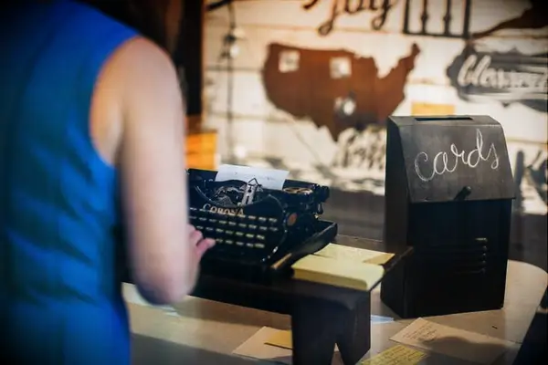 Guest writing on vintage typewriter