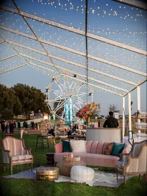 Reception with lounge seating and Ferris wheel