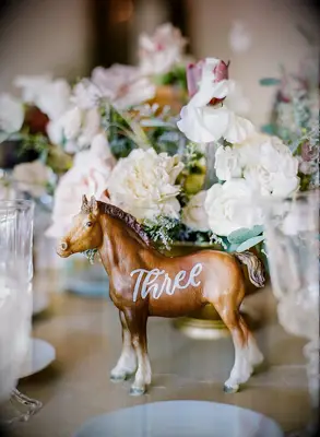 Calligraphed horse as rustic table number