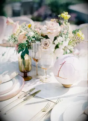 Table numbers personalized on soccer balls