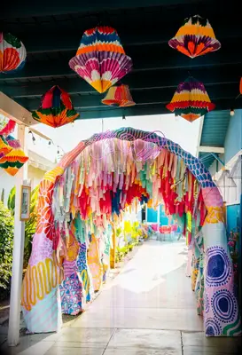 Fun wedding archway in bright colors