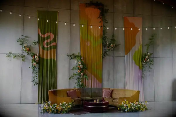 Orange 70s-themed wedding backdrop