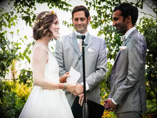 Bride and Groom share vows at civil ceremony.