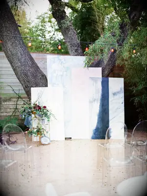 abstract wedding arch alternative with art canvases in pink and blue patterns