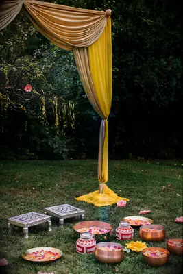 gold draping for haldi ceremony arch