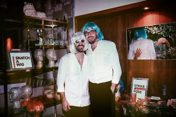 wear fun and vibrant colorful wigs at your wedding photo booth