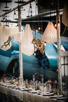 boho lantern tablescape at wedding reception